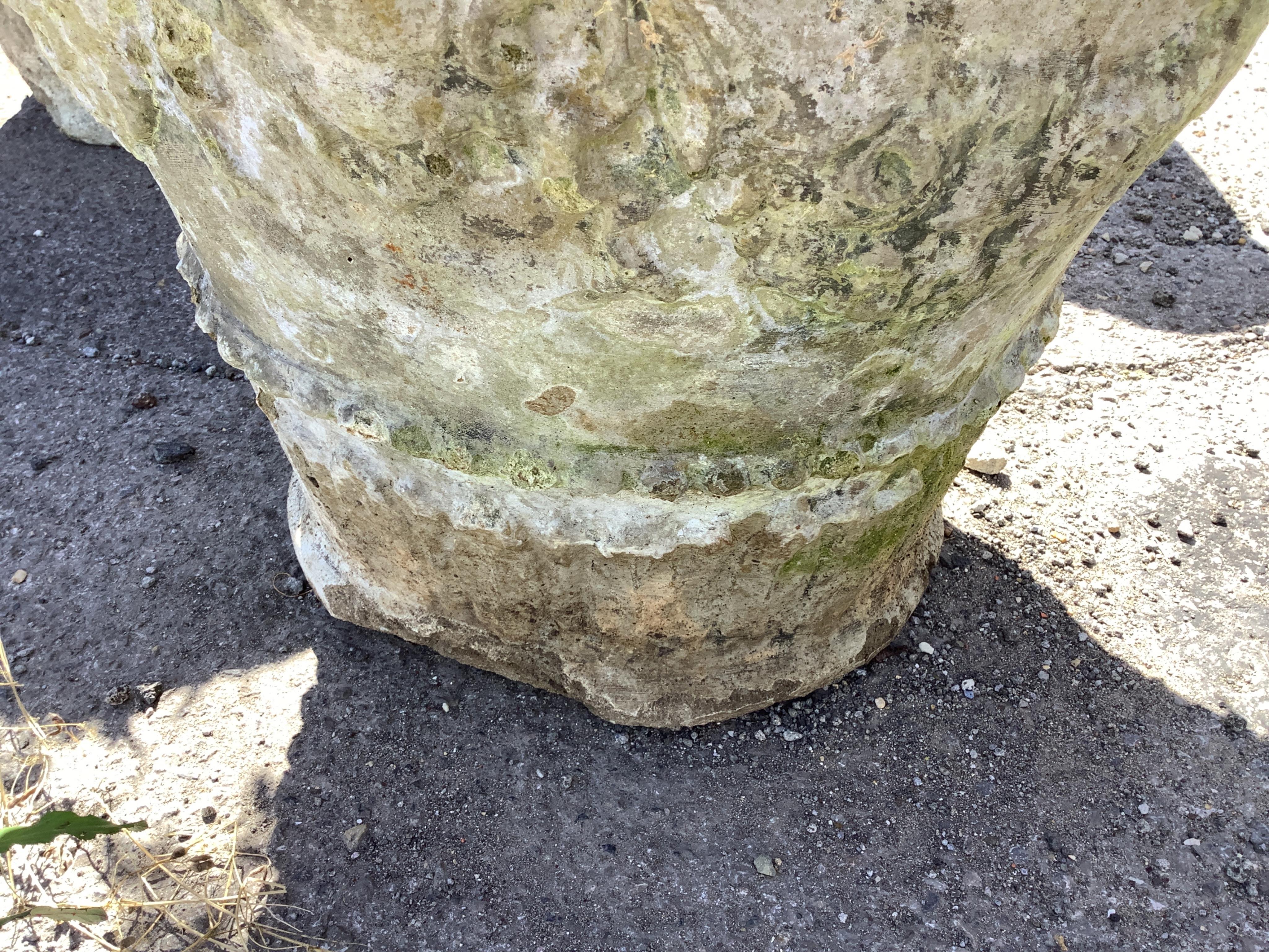 A pair of reconstituted stone garden planters, diameter 60cm, height 48cm